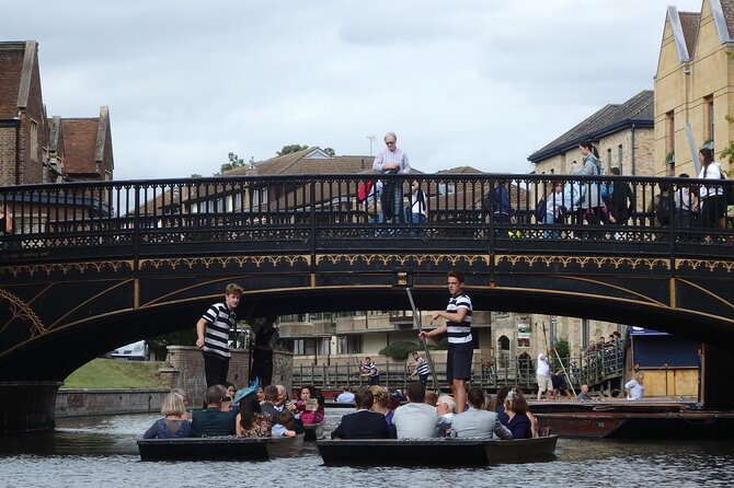 Cambridge University Colleges Guided Punting Tour - A graceful-arch timber bridge view and Gothic front-row moments