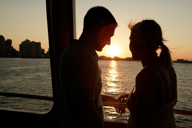 City Cruises Boston 90-Minute Harbor Sunset Sightseeing Cruise - USS Constitution at Sunset: The Cannon and Flag Moment